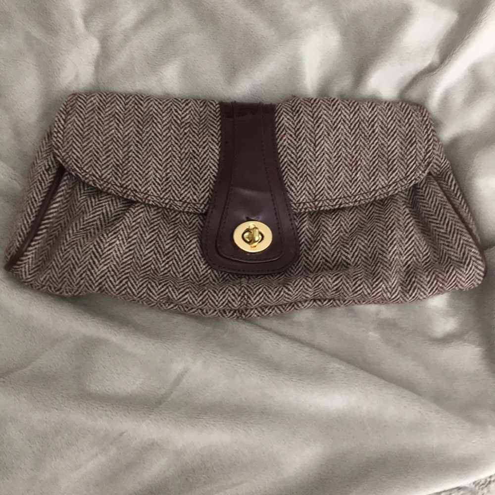 {Donated} Herringbone Clutch